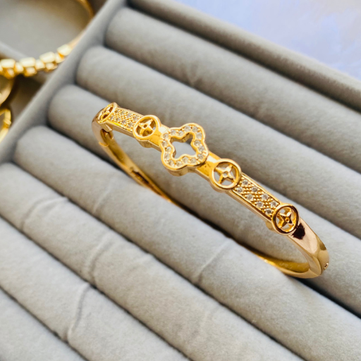 Clove AD studded Golden Bracelet