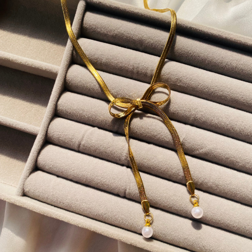 Bow with Pearl Snake Chain Pendant